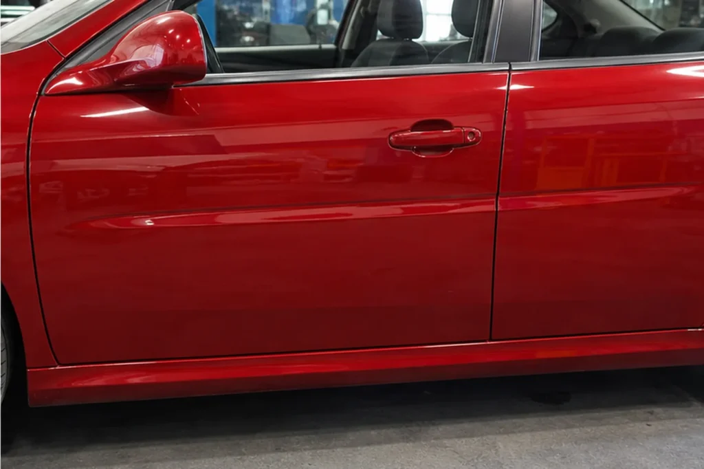 Red Door Paint Refinishing, after repair