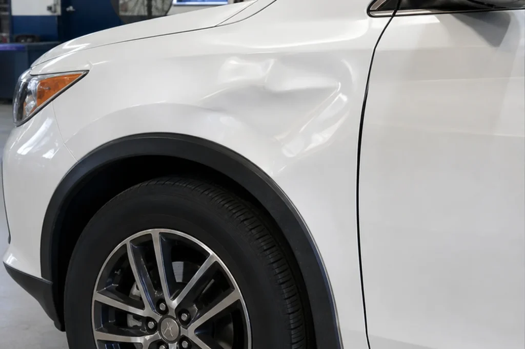 Fender Dent Repair, before repair